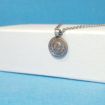 Radiant Sun: Silver Surya Pendant - Symbol of Vitality and Radiance