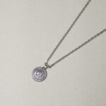 Radiant Sun: Silver Surya Pendant - Symbol of Vitality and Radiance