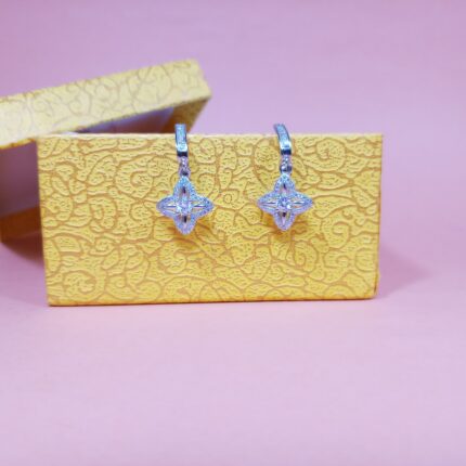 Radiant Whispers: Adorn Yourself with Our Elegantly Crafted Earrings