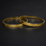 Golden Elegance: Exquisite Kangan with Gold Polish