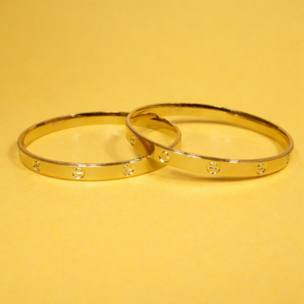 Golden Elegance: Exquisite Kangan with Gold Polish