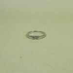 Starlight Embrace: Sterling Silver Solitaire Ring