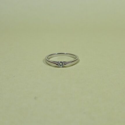 Starlight Embrace: Sterling Silver Solitaire Ring