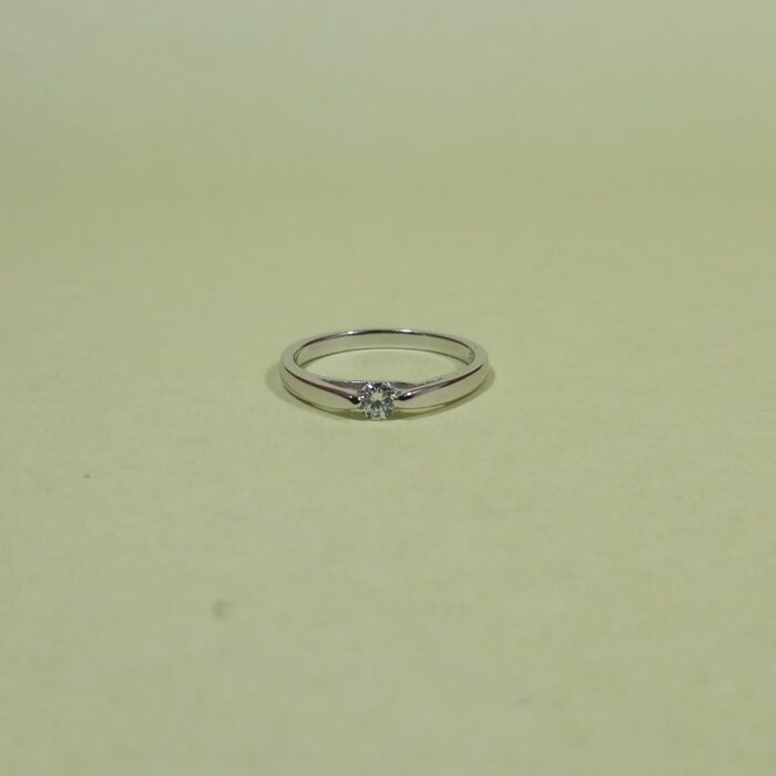 Starlight Embrace: Sterling Silver Solitaire Ring