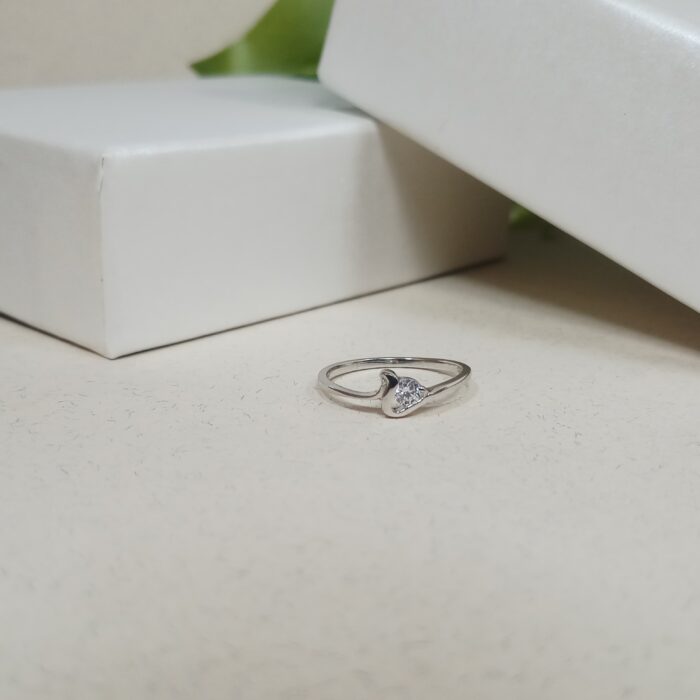 Radiant Solitude: Sterling Silver Solitaire Ring