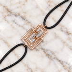 edit rosegold bracelet with wooden background with 1:1 format with white pouch