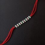 Shimmering Silver Beads Rakhi