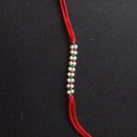 Shimmering Silver Beads Rakhi