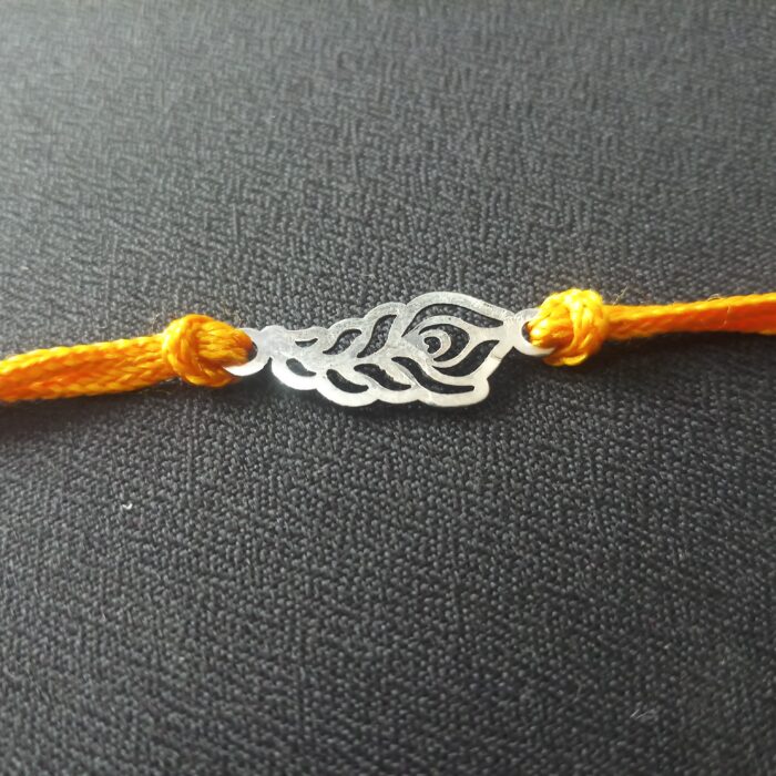 Elegant Plumage: Handcrafted Morpankh Silver Rakhi