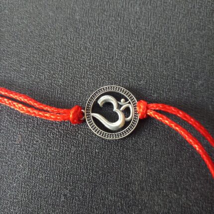 Divine Om Rakhi: Sterling Silver Elegance