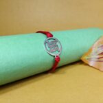 Saankhiya Serenity: Handcrafted Rakhi Collection