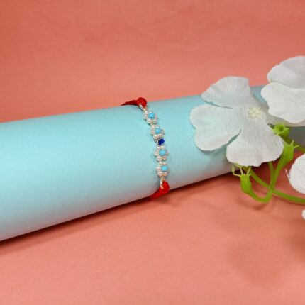 Divine Pearl Rakhi in Sterling Silver