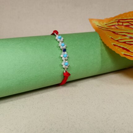 Divine Pearl Rakhi in Sterling Silver