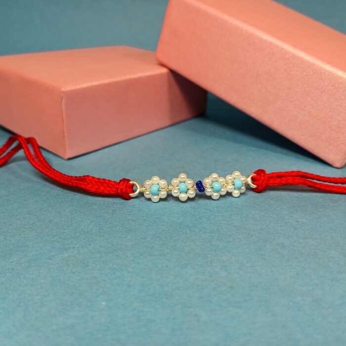 Divine Pearl Rakhi in Sterling Silver