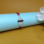 Radiant Silver Beads Rakhi
