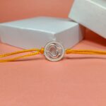 Divine Om Rakhi: Sterling Silver Elegance