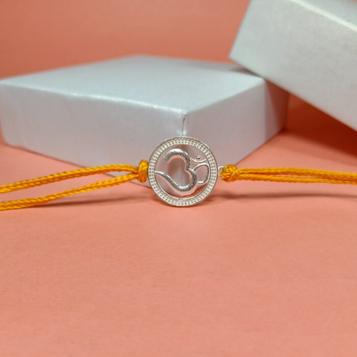 Divine Om Rakhi: Sterling Silver Elegance