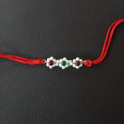 Graceful Pearl Rakhi: Symbol of Purity and Love