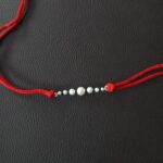 Pearl Rakhi: Embrace Tradition with Elegance