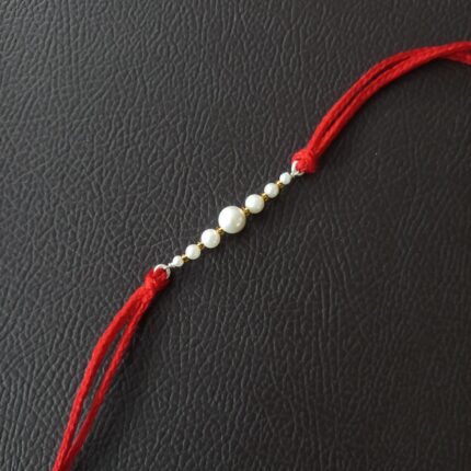 Radiant Pearl Rakhi: Symbolizing Purity and Love