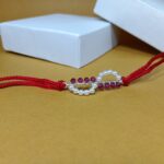 Timeless Pearl Rakhi: Celebrating Sibling Bond with Elegance