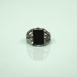 Kaalbindu: Bold Black Stone Men's Ring with Intricate Design