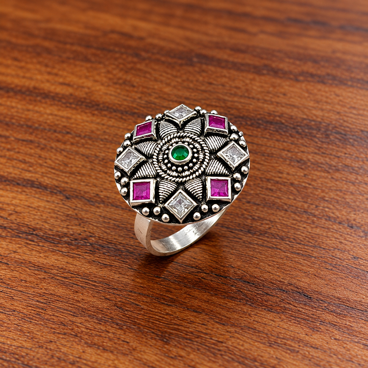 Ornate Silver Mandala Ring on Wood Elegant Silver Ring Featuring a Radiant Cut Stone