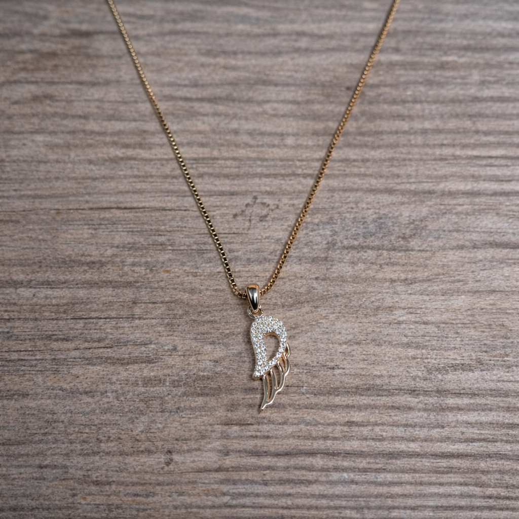 Silver wing pendant on gold chain Shanaya 925 Silver Pendant – A Blend of Tradition and Modernity