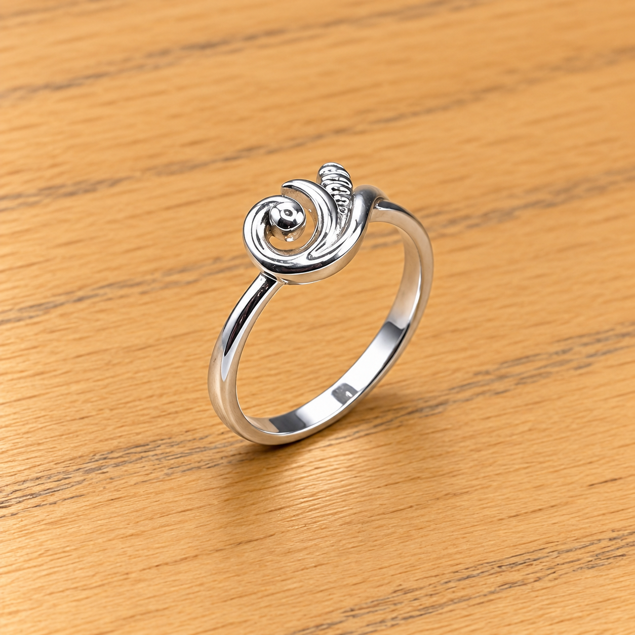 Polished Silver Swirl Ring on Wood Elegant Silver 925 Ring – Timeless & Stylish