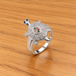 **edit silver ring with light velvet background**