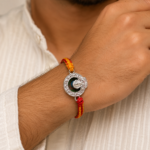 Divine Ganesha Silver Rakhi with Red & Yellow Thread