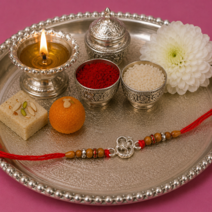 Pure Silver Ganesh Rakhi with Sacred Symbol & Traditional Thread