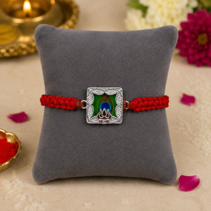 Silver Peacock Feather & Trishul Rakhi with Red Thread