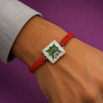 Silver Peacock Feather & Trishul Rakhi with Red Thread
