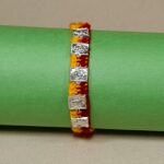 Silver Five Ganesha Rakhi – Symbol of Pure Bond