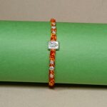 Ganesha with Six Peice Silver Rakhi – Symbol of Pure Love & Protection