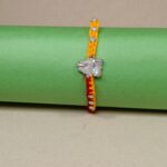 Damru Silver Rakhi – A Precious Thread of Love