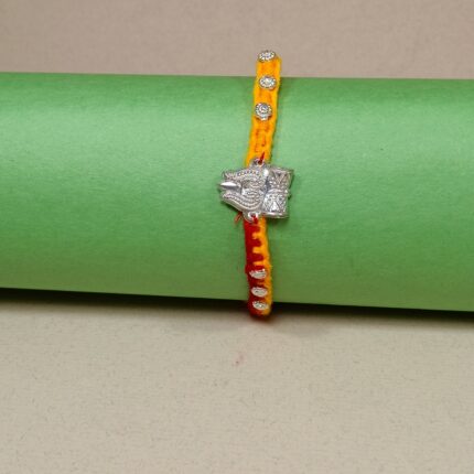 Damru Silver Rakhi – A Precious Thread of Love