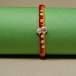 Kalash with Six Flower Silver Rakhi – A Pure Thread of Love