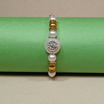 Ganesha with Silver Balls Rakhi – Symbol of Pure Love & Protection