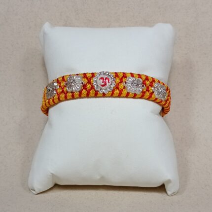 Om with 4 Flowers Silver Rakhi – Forever Tied in Purity & Love