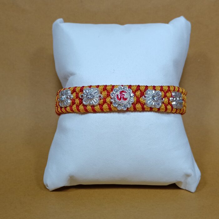 Om with 4 Flowers Silver Rakhi – Forever Tied in Purity & Love