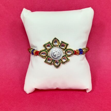 Elegant Pure Silver Om Rakhi With Kundan – Symbol of Bond & Blessings