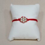 Divine Bond Silver Flower Rakhi – Crafted in Pure Silver