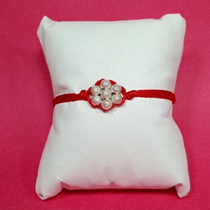 Divine Bond Silver Flower Rakhi – Crafted in Pure Silver