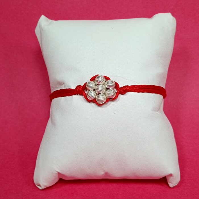Divine Bond Silver Flower Rakhi – Crafted in Pure Silver
