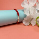 Simple & Elegant Pure Beads Rakhi with Red Thread