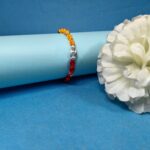Pure Silver Beads Rakhi with Dual-Tone Red & Yellow Thread