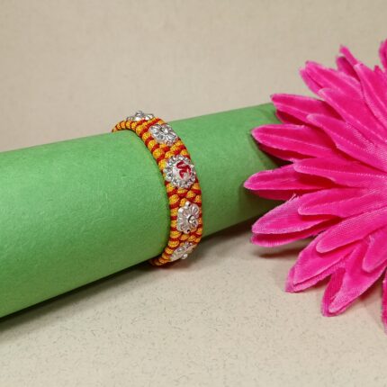 Om with 4 Flowers Silver Rakhi – Forever Tied in Purity & Love
