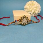 Elegant Pure Silver Om Rakhi With Kundan – Symbol of Bond & Blessings